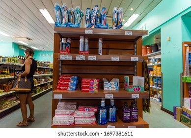 Victoria, Seychelles - January 7, 2020: Almost Empty Shelves With Toothpaste And Toothbrushes At The Super Market Of Victoria.