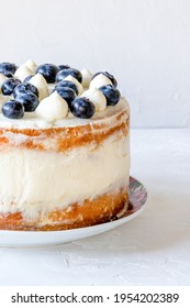 Victoria Sponge Cake with Mascarpone Cream and Blueberries. - Shutterstock ID 1954202389