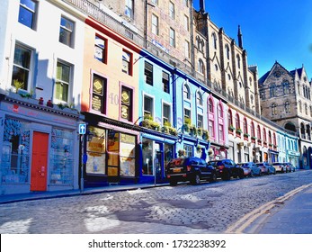 Victoria street, colourful medieval shopping high street, usually full of tourists, empty and closed during coronavirus. May 2020. Edinburgh City Scotland. UK.