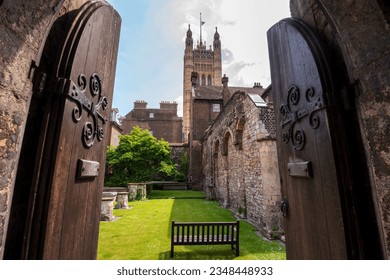 Victoria Tower, Palace of Westminster in London. Victoria Tower is taller than Elizabeth Tower, Big Ben at Westminster Palace. Looking past the medieval wood doors into the English garden courtyard. - Powered by Shutterstock