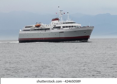 Victoria,BC,Canada,May 21,2016: A ferry from port angeles in cloudy day come back to victoria,BC,Canada