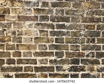 Victorian brickwork. Yellow brick wall in sunlight on a property built in 1890, London, UK.