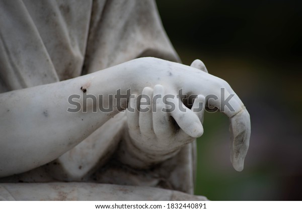 Victorian\
cemetery pieta statue hands of Jesus and Mary in white stone. Full\
frame, shot in natural light with copy\
space.