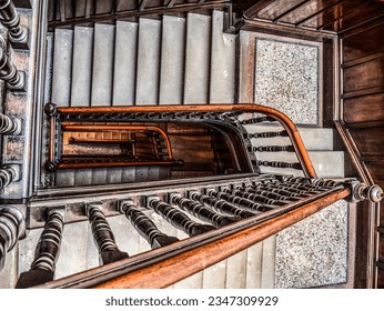 victorian marble and mahogany spiral staircase in Glasgow tenement building