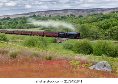 Victorian Steam Train Crossing Through North Yorkshire Countryside