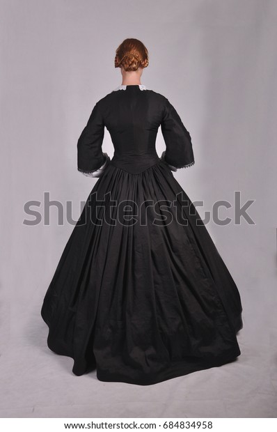 Victorian woman plain\
background back view
