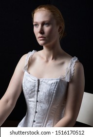 Victorian Woman Wearing A Corset, Chemise And Bloomers.