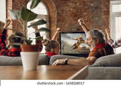 Victory. Excited, Happy Family Watching American Football Match, Championship On The Couch At Home. Fans Emotional Cheering For Favourite National Team. Daughter, Dad And Grandpa. Sport, TV, Having