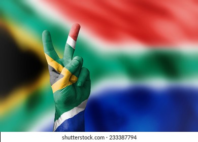 Sieg der Republik Südafrika mit nationaler Flagge im Hintergrund