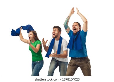 Victory. Three soccer fans woman and men cheering for favourite sport team with bright emotions isolated on white studio background. Looking excited, supporting. Concept of sport, fun, support. - Shutterstock ID 1878104023