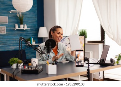 Video Blogger Recording Talk Show In Home Studio Podcast Using Modern Equipment. Creative Content Creator Influencer Vlogger Making Online Series With Giveaway For Audience .