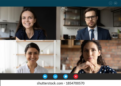 Video call application computer gadget screen view happy diverse multiracial young businesspeople colleagues involved in project discussion, enjoying modern distant online working communication. - Shutterstock ID 1854700570