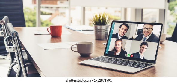 Video call business people meeting on virtual workplace or remote office. Telework conference call using smart video technology to communicate colleague in professional corporate business. - Shutterstock ID 1752871991
