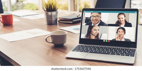 Video call business people meeting on virtual workplace or remote office. Telework conference call using smart video technology to communicate colleague in professional corporate business. - Powered by Shutterstock