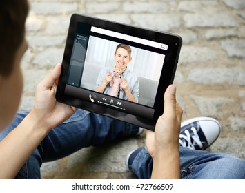 Video call and chat concept. Modern communication technology. Man video conferencing on tablet.