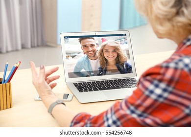 Video Call And Chat Concept. Senior Woman Video Conferencing On Laptop