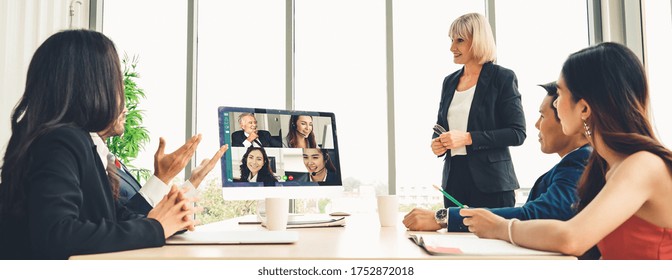 Video Call Group Business People Meeting On Virtual Workplace Or Remote Office. Telework Conference Call Using Smart Video Technology To Communicate Colleague In Professional Corporate Business.