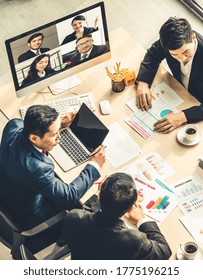 Video Call Group Business People Meeting On Virtual Workplace Or Remote Office. Telework Conference Call Using Smart Video Technology To Communicate Colleague In Professional Corporate Business.