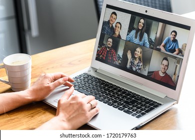 Video call. Icons of a group of people on laptop screen, app for video online communication. Female hands on the keyboard - Shutterstock ID 1720179763
