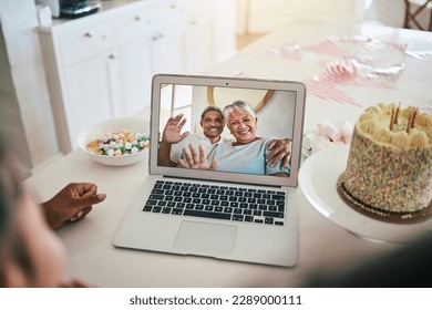 Video call, laptop and family with birthday cake, wave hello and virtual celebration, party and happy child talk at home. Biracial grandparents or people celebrate on computer screen for online chat - Powered by Shutterstock