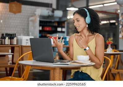 Video call, remote work and black woman in coffee shop on laptop talking, in discussion and meeting. Communication, freelance and girl on computer for webinar, virtual conference and networking - Powered by Shutterstock