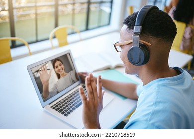 Video Call, Webinar And Male Student Or Employee Waving For Conference Meeting On Laptop, Headphone And Computer For Communication. Remote Black Man On Online Zoom For Education Or Chatting To Friend