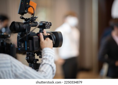 Video camera with blur background - Shutterstock ID 2250334879