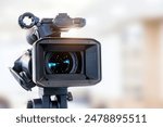 Video camera with blur background for journalist interview broadcasting reporter news or press conference speaker or public speaking or meeting report record and content creator live media concepts.