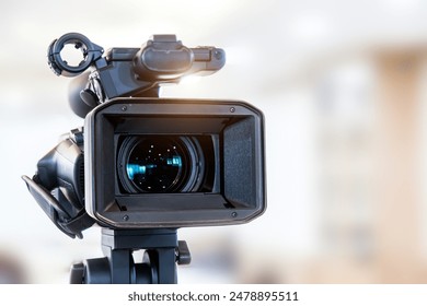 Video camera with blur background for journalist interview broadcasting reporter news or press conference speaker or public speaking or meeting report record and content creator live media concepts.