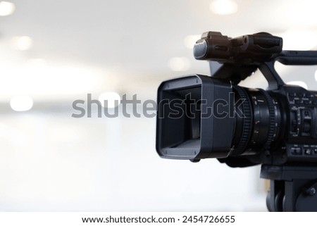 Video camera with blur background for journalist interview broadcasting reporter news or press conference speaker or public speaking or meeting report record and content creator live media concepts.