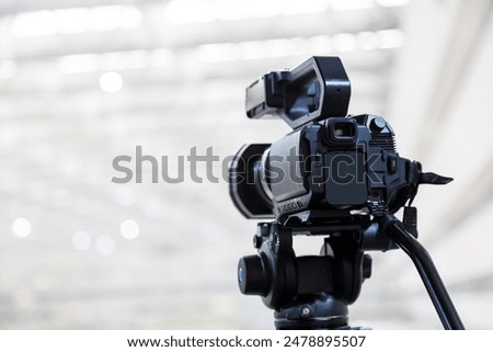 Video camera with blur background for journalist interview broadcasting reporter news or press conference speaker or public speaking or meeting report record and content creator live media concepts.