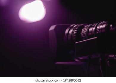 Video camera on concert stage studio.video cinema lens studio.Movie production.Action, theatre day.Director, film industry, 4k 8k camera.Video live streaming. Broadcast television.event film.Producer