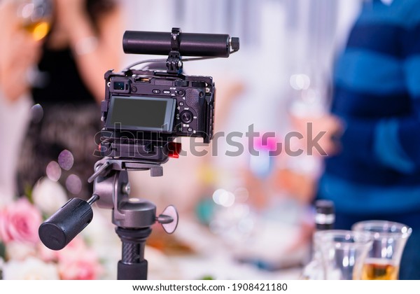video camera on a tripod. installation of
equipment for shooting events and holidays. professional shooting.
Russia, Rostov-on-Don,
21.01.2021