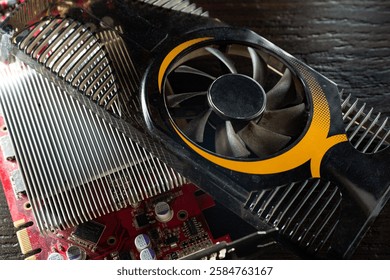 Video card. Processor core detail. Board, Details, Electronic circuit and video card chip. Cooling stabilizer. Close-up. Partially blurred photo.