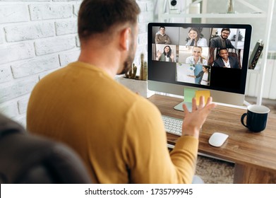 Video conference. Business partners communicate via video conference using computer. The guy talks with his business partners appearance about plans and strategy. Distant work - Shutterstock ID 1735799945