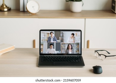 Video Conference. WFH Technology. Professional Telecommuting. Diverse Business Coworkers Working From Home Online Discussing Strategy In Digital Office On Laptop Screen.