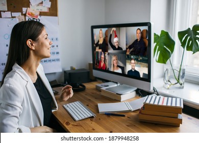 Video Conferencing. Young Woman Having Video Call Via Computer In The Home Office. Multiethnic Business Team. Virtual House Party. Teacher Online Team Meeting Video Conference Calling From Home