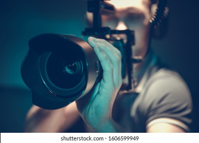 Video Content Creating. Caucasian Filmmaker with DSLR Camera Taking Shoots For His New Production. Videography Theme. - Shutterstock ID 1606599949