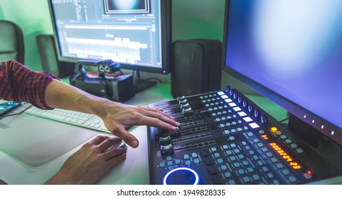 Video editing, recording and cutting room with monitors and sound mixing desk - Shutterstock ID 1949828335