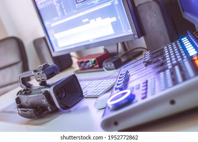 Video editing, recording and cutting room with monitors, camera and sound mixing desk - Shutterstock ID 1952772862