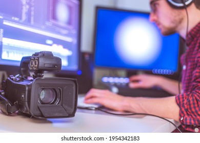 Video editing, recording and cutting room with monitors, camera and sound mixing desk - Shutterstock ID 1954342183