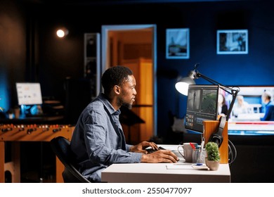 Video editor creating visual effects on film montage at home, working on color correction and grading to edit footage and frames. Freelancer digital creator editing clips on computer software.