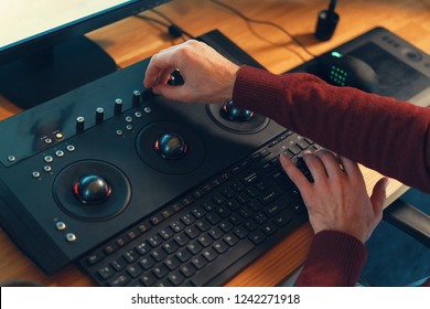 Video Editor Hands Adjusting Color Or Sound On Working Console Machine In The Post Production Stage.