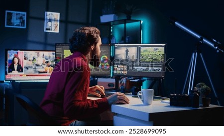 Video editor using his experience with special effects and editing software packages to upgrade footage shot by production teams. Videographer finishing project in multimedia agency