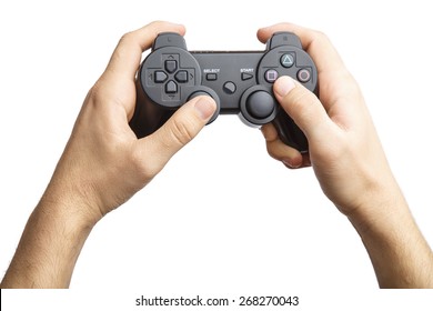 Video game console controller in gamer hands.Game controller in hand isolated on white background. Alpha