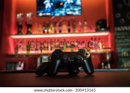 Video games at bar counter