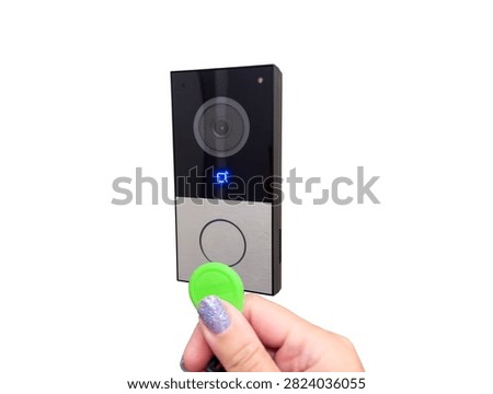 Video intercom doorbell with RFID access key isolated on transparent background for secure entry systems. Smart access control equipment for residential and commercial building security.