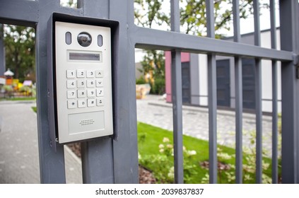 Video intercom on the gate at the entrance to the residential area. Electronic intercom to a private area. closed residential yard - Shutterstock ID 2039837837