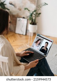 Video Interview. Virtual Meeting. Web Conference. Female Leader Working From Home Discussing Project Online With Diverse Business Team On Laptop Screen In Digital Office.