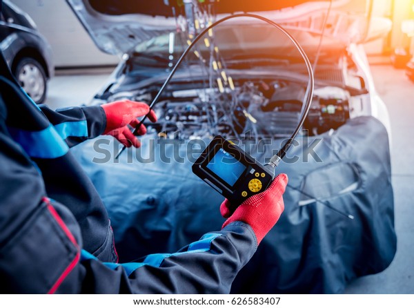 Video investigate. Engine diagnostics. Car\
repair. Service station.